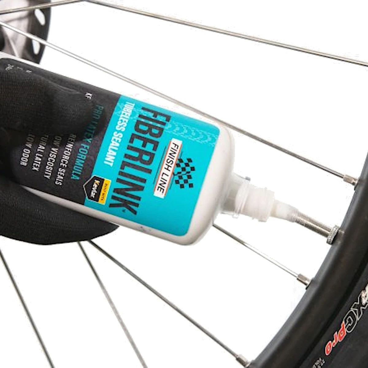 Finish Line FiberLink Tubeless Latex Tyre Sealant 4 Finish Line FiberLink Tubeless Latex Tyre Sealant - Billede 2